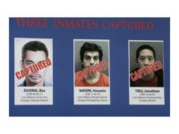 Three inmates captured are seen on a video monitor at Orange County Sheriff's news conference in Santa Ana, Calif., Monday, Feb. 1, 2016. The inmates from left, Bac Duong, 43, Hossein Nayeri, 37, and Jonathan Tieu, 20, who escaped on Jan. 22 from Central Men's Jail in Orange County. Duong turned himself in Friday and the other two were arrested in San Francisco on Saturday. (AP Photo/Nick Ut)