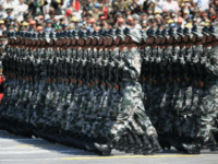 China's People's Liberation Army (PLA) soldiers march past Tiananmen Gate during a military parade in Beijing on September 3, 2015
