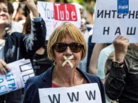 TOPSHOT - A protester with tape covering her mouth takes part in the March for Free Internet in central Moscow on July 23, 2017. / AFP PHOTO / Mladen ANTONOV (Photo credit should read MLADEN ANTONOV/AFP/Getty Images)