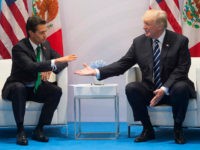 US President Donald Trump and Mexican President Enrique Pena Nieto hold a meeting on the sidelines of the G20 Summit in Hamburg, Germany, on July 7, 2017. SAUL LOEB / AFP