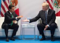 US President Donald Trump (R) and Mexican leader Enrique Pena Nieto held talks on the sidelines of the G20 summit, including the contentious issue of migration