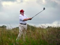 Donald Trump plays a stroke in 2012 as he officially opens his multimillion pound Trump International Golf Links course in Aberdeenshire, Scotland