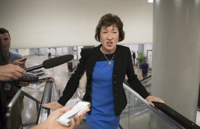 Sen. Susan Collins, R-Maine, and other lawmakers head to the Senate on Capitol Hill in Washington, Thursday, July 13, 2017, for a meeting on the revised Republican health care bill which has been under attack from within the party, including Sen. Collins. (AP Photo/J. Scott Applewhite)