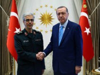 ANKARA, TURKEY - AUGUST 16: President of Turkey Recep Tayyip Erdogan (R) shakes hands with General Staff of the Armed Forces of Iran, Mohammad Bagheri (L) ahead of their meeting at Presidential Complex in Ankara, Turkey on August 16, 2017. (Photo by Kayhan Ozer/Anadolu Agency/Getty Images)