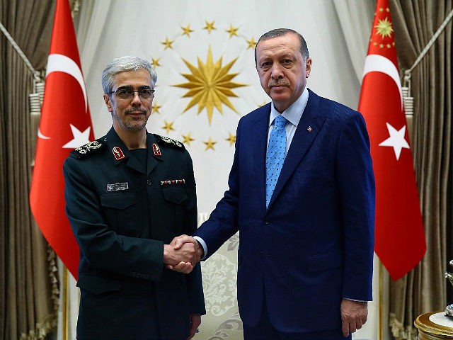 ANKARA, TURKEY - AUGUST 16: President of Turkey Recep Tayyip Erdogan (R) shakes hands with General Staff of the Armed Forces of Iran, Mohammad Bagheri (L) ahead of their meeting at Presidential Complex in Ankara, Turkey on August 16, 2017. (Photo by Kayhan Ozer/Anadolu Agency/Getty Images)