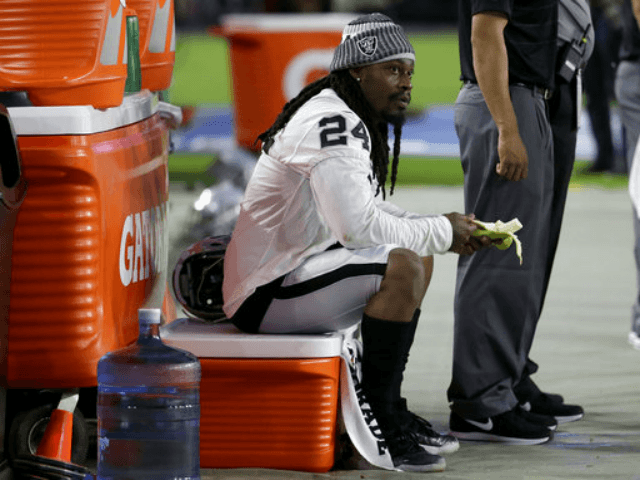 Marshawn Lynch Sits During the National Anthem Prior to Raiders Preseason Game in Arizona - Breitbart
