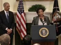 Attorney General nominess Loretta Lynch (C) speaks after U.S. President Barack Obama (R) introduced here as his nominee to replace Eric Holder (L) during a ceremony in the Roosevelt Room of the White House November 8, 2014 in Washington, DC. Lynch has recently been the top U.S. prosecutor in Brooklyn, and would be the first African American woman to hold the position of Attorney General if confirmed. (Photo by Win McNamee/Getty Images)