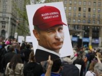 Vladimir Putin MAGA hat (Eduardo Munoz Alvarez / Getty)