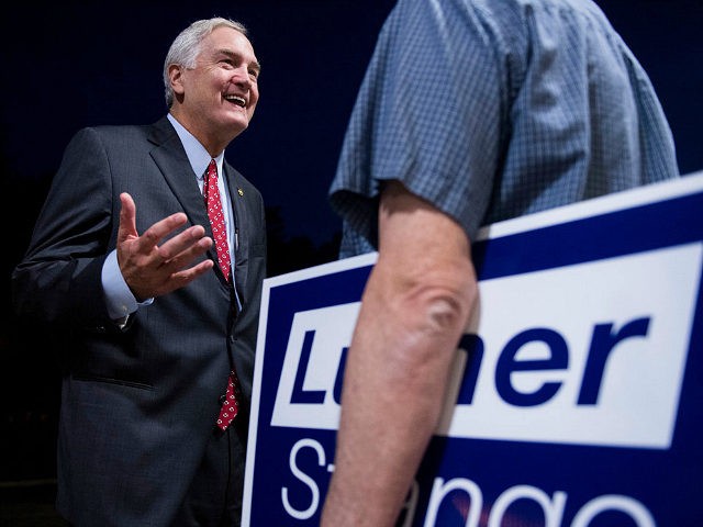 UNITED STATES - AUGUST 4: GOP candidate for U.S. Senate Sen. Luther Strange, R-Ala., left, speaks with a supporter after the U.S. Senate candidate forum held by the Shelby County Republican Party in Pelham, Ala., on Friday, Aug. 4, 2017. Sen. Strange is running in the special election to fill the seat vacated by Attorney General Jeff Sessions. (Photo By Bill Clark/CQ Roll Call)