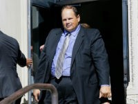 Former lottery security officer Eddie Tipton leaves the Polk County Courthouse after sentencing, Wednesday, Sept. 9, 2015, in Des Moines, Iowa. Tipton was sentenced to 10 years after a jury found he fixed the hot Lotto game in 2010 to get himself a winning ticket for a $14 million jackpot and then attempted to cash it anonymously. (AP Photo/Charlie Neibergall)