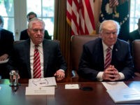 President Donald Trump, accompanied by Secretary of State Rex Tillerson, White House Senior Adviser Steve Bannon, left, and National Security Adviser H.R. McMaster, right, participates in a Cabinet meeting, Monday, June 12, 2017, in the Cabinet Room of the White House in Washington. (AP Photo/Andrew Harnik)