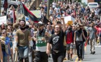 Protesters march in Charlottesville, Virginia on August 12, 2017