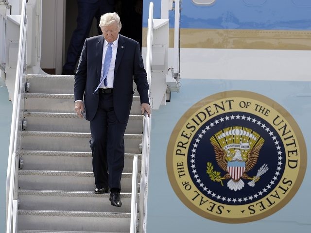 President Donald Trump steps off Air Force One after arriving, Wednesday, Sept. 27, 2017, in Indianapolis. (AP Photo/Darron Cummings)