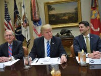 US President Donald Trump is seated for a a lunch with Republican Party House and Senate leadership, including Senate Majority Leader Mitch McConnell (L) and House Speaker Paul Ryan, in the Roosevelt Room of the White House in Washington, DC on March 1, 2017. / AFP PHOTO / Mandel Ngan (Photo credit should read MANDEL NGAN/AFP/Getty Images)