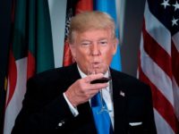 US President Donald Trump sips a glass after making a toast during a luncheon at the United Nations headquarters during the 72nd session of the United Nations General Assembly September 19, 2017 in New York. / AFP PHOTO / Brendan Smialowski (Photo credit should read BRENDAN SMIALOWSKI/AFP/Getty Images)
