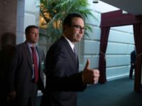 US Treasury Secretary Steven Mnuchin gives a thumbs up as he arrives at a House Republican Conference to push for President Donald Trump's hurricane relief package and the lifting of the US debt ceiling