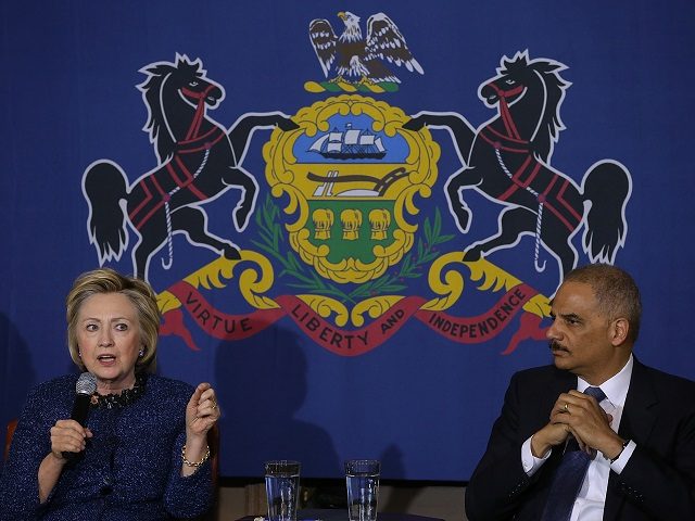 PHILADELPHIA, PA - APRIL 20: Democratic presidential candidate former Secretary of State Hillary Clinton (L) and former attorney general (R) participate in a panel discussion on gun violence at St. Paul's Baptist Church on April 20, 2016 in Philadelphia, Pennsylvania. Hillary Clinton and former attorney general Eric Holder held a panel discussion with parents of victims of gun and police violence. (Photo by Justin Sullivan/Getty Images)