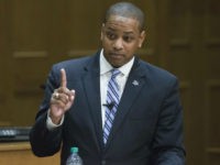 In this Thursday Oct. 5, 2017 photo Democrat Justin Fairfax gestures during a debate with Republican Virginia State Sen. Jill Vogel, right, at the University of Richmond in Richmond, Va. Fairfax, a former federal prosecutor, and Vogel, a state senator from Fauquier County, are running for lieutenant governor in next month’s election. The post that offers few formal duties other than breaking ties in the state Senate but invariably serves as a launching post for future gubernatorial runs. (AP Photo/Steve Helber)