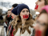 Anti-abortion activists converge in front of the Supreme Court in Washington, Friday, January 27, 2017, during the annual March for Life