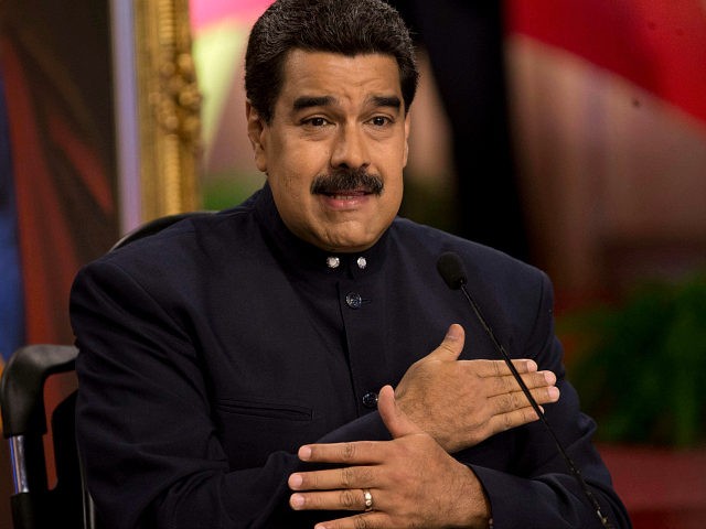 Venezuela's President Nicolas Maduro speaks at a news conference in Caracas, Venezuela, Tuesday, Aug. 22, 2017. Immigration authorities in Colombia announced that Venezuela's ousted chief prosecutor Luisa Ortega Diaz is on her way to Brazil. Ortega said that Maduro removed her in order to stop a probe linking him and his inner circle to nearly $100 million in bribes from Brazilian construction company Odebrecht. (AP Photo/Ariana Cubillos)