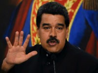 Venezuelan President Nicolas Maduro offers a press conference at the Miraflores presidential palace in Caracas on August 22, 2017. Chile said Tuesday it has granted diplomatic asylum to five Venezuelans who took refuge in its embassy in Caracas, amid political turmoil as Maduro moves to consolidate power. The five were among a group of 33 jurists who had been named to the Venezuelan Supreme Court by the opposition-controlled National Assembly on July 31 in defiance of the government. / AFP PHOTO / Juan BARRETO (Photo credit should read JUAN BARRETO/AFP/Getty Images)