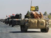Iraqi forces drive towards the disputed city of Kirkuk on October 16, 2017
