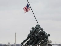 WASHINGTON, USA - MARCH 14: Snow falls on the Iwo Jima Memorial and the National Mall behind it during an abnormally late snow fall in Washington, United States on March 14, 2017. Winter Storm Stella brought snow to the Northeast region. Although not among the hardest hit, Washington is still experiencing snowy, wintry weather from the storm. (Photo by Samuel Corum/Anadolu Agency/Getty Images)