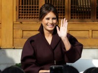 U.S. first lady Melania Trump and Choi Min-ho, a member of South Korean boy band Shinee, wave to South Korean middles school students during "Girls Play 2!" Initiative, an Olympic public diplomacy outreach campaign, at the U.S. Ambassador's Residence in Seoul, South Korea, Tuesday, Nov. 7, 2017. (AP Photo/Ahn Young-joon. Pool)