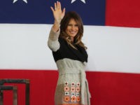 PHOTOS: Melania Trump Takes Tokyo in Embellished, Ombre Fendi Coat