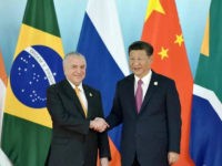 XIAMEN, CHINA - SEPTEMBER 04: Chinese President Xi Jinping (R) shakes hands with Brazil's President Michel Temer before the group photo during the BRICS Summit at Xiamen International Conference and Exhibition Centre on September 4, 2017 in Xiamen, China. The 9th BRICS summit is held from Sep 3 to 5 in Xiamen. (Photo by Mao Jianjun/CHINA NEWS SERVICE/VCG via Getty Images)