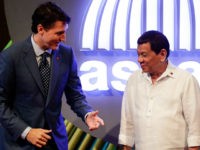Canadian Prime Minister Justin Trudeau (L) talks to Philippine President Rodrigo Duterte (R) before the opening ceremony of the 31st Association of Southeast Asian Nations (ASEAN) Summit in Manila on November 13, 2017. World leaders are in the Philippines' capital for two days of summits. / AFP PHOTO / AFP PHOTO AND POOL / Mark R. CRISTINO (Photo credit should read MARK R. CRISTINO/AFP/Getty Images)