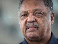 Civil rights leader Reverend Jesse Jackson leads a small group from the Rainbow PUSH Coalition in a protest outside the United Airlines terminal at O'Hare International Airport on April 12, 2017 in Chicago, Illinois. United Airlines has been struggling to repair their corporate image after a cell phone video was released showing a passenger being dragged from his seat and bloodied by airport police after he refused to leave a reportedly overbooked flight that was preparing to fly from Chicago to Louisville. (Photo by Scott Olson/Getty Images)