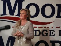 FAIRHOPE, AL - SEPTEMBER 25: Kayla Moore, the wife of Republican candidate for the U.S. Senate in Alabama Roy Moore, listens as her husband speaks at a campaign rally on September 25, 2017 in Fairhope, Alabama. Moore is running in a primary runoff election against incumbent Luther Strange for the seat vacated when Jeff Sessions was appointed U.S. Attorney General by President Donald Trump. The runoff election is scheduled for September 26. (Photo by Scott Olson/Getty Images)