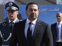 In this photo taken on Friday, Sept. 8, 2017, Lebanese Prime Minister Saad Hariri, left, arrives for a mass funeral of ten Lebanese soldiers at the Lebanese Defense Ministry, in Yarzeh near Beirut, Lebanon. Lebanese prime minister Saad Hariri has announced he is resigning in a surprise move following a trip to Saudi Arabia. In a televised address Saturday, Nov. 4, he slammed Iran and the Lebanese Hezbollah group for meddling in Arab affairs and says "Iran's arms in the region will be cut off." (AP Photo/Hassan Ammar)