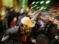 Egyptian police attend the scene outside the Al-Husseini mosque in the Khan el-Khalili market following a blast, in Cairo, Egypt, Sunday, Feb. 22, 2009. An explosion ripped into the famed bazaar in medieval Cairo killing a French woman and wounding at least 21 people, most of them foreign tourists, the government said, in the first attack on tourists in Egypt in three years. (AP Photo/Nasser Nouri)