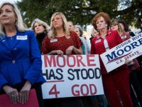 roy-moore-supporters-2-getty MONTGOMERY, AL - NOVEMBER 17: Women attend a 'Women For Moore' rally in support of Republican candidate for U.S. Senate Judge Roy Moore, in front of the Alabama State Capitol, November 17, 2017 in Montgomery, Alabama. Kayla Moore told the crowd of supporters that her husband will not bow out …