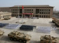 Beijing has been flexing its military muscle, opening its first overseas military base in Djibouti and building militarised artificial islands in the disputed South China Sea