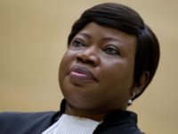 FILE - In this Tuesday, Sept. 29, 2015 file photo, prosecutor Fatou Bensouda in the International Criminal Court in The Hague, Netherlands. The International Criminal Court prosecutor Bensouda has asked judges to authorize an investigation into various allegations of war crimes in Afghanistan, asserted against the U.S. military, CIA, the Taliban and by Afghan security forces. (AP Photo/Peter Dejong, FILE)