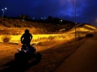Border Patrol agent on ATV in San Diego Sector