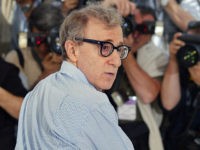 DylanFarrowRipsHollywoodWoodyAllen US director Woody Allen poses for photographers on a terrace of the Palais des festivals during the photocall for his film 'Hollywood Ending' at the 55th Cannes Film Festival 15 May 2002. Woody Allen's latest film will open the festival out of competition. AFP PHOTO FRANCOIS GUILLOT (Photo credit should …