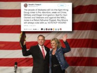 Republican Senatorial candidate Roy Moore stands with his wife Kayla Moore during a campaign event at Oak Hollow Farm on December 5, 2017 in Fairhope, Alabama. Mr. Moore is facing off against Democrat Doug Jones in next week's special election for the U.S. Senate. (Photo by Joe Raedle/Getty Images)