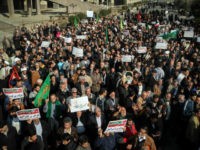 A rally in support of the Iranian government in Tehran on Saturday. The demonstration followed days of unauthorized protests about the economy. Credit Hamed Malekpour/Agence France-Presse — Getty Images