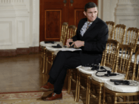 National Security Adviser Michael Flynn sits in the front row before the start of the President Donald Trump and Japanese Prime Minister Shinzo Abe joint new conference in the East Room of the White House, in Washington, Friday, Feb. 10, 2017. (AP Photo/Carolyn Kaster)