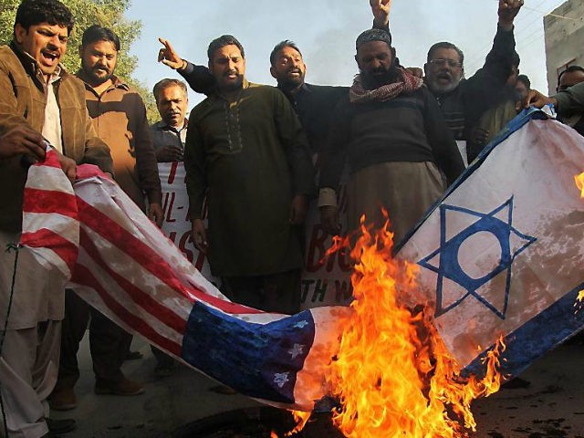 Palestinian-protesters-burn-Israeli-U.S.-flags-December-7-2017-getty-1-640x480.jpg