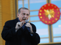 Turkish President Tayyip Erdogan gives a referendum victory speech to his supporters at the Presidential Palace on April 17, 2017 in Ankara Turkey. Erdogan declared victory in Sunday's historic referendum that will grant sweeping powers to the presidency, hailing the result as a 'historic decision. 51.4 per cent per cent of voters had sided with the 'Yes' campaign, ushering in the most radical change to the country's political system in modern times.Turkey's main opposition calls on top election board to annul the referendum. OSCE observers said that a Turkish electoral board decision to allow as valid ballots that did not bear official stamps undermined important safeguards against fraud. (Photo by Elif Sogut/Getty Images)