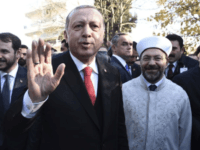 Turkish President Recep Tayyip Erdogan waves to the crowd as he goes to Minority School in the northeastern Greek town of Komotini, Friday, Dec. 8, 2017. Erdogan met Friday with members of Greece’s Muslim minority on the second day of a visit to the country that saw tensions in bilateral relations resurface. (AP Photo/Giannis Papanikos)