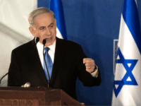 Israeli Prime Minister Benjamin Netanyahu delivers a speech during a swearing-in ceremony for Israel's new Chief of Staff Gadi Eisenkot at the Prime Minister's Jerusalem offices on February 16, 2015. AFP PHOTO / MENAHEM KAHANA (Photo credit should read MENAHEM KAHANA/AFP/Getty Images)