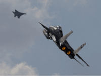 In this Wednesday, Nov. 8, 2017 photo Two Israeli air force F-15s of the Knights of the twin tail 133 squadron fly over Ovda airbase near Eilat, southern Israel, during the 2017 Blue Flag exercise. Israel's military is holding the largest ever air drill of its kind with pilots from eight countries simulating combat scenarios. It said Thursday that Germany, India and France are taking part for the first time in the two week drill codenamed 