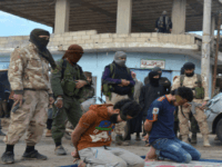 Graphic Photos: Islamic State Partner Executes Three Syrian Civilians Accused of Cooperating With Opposition