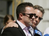 Brad Steinle, left, and Jim Steinle, right, the brother and father of Kathryn Steinle, answer questions during a news conference on the steps of City Hall Tuesday, Sept. 1, 2015, in San Francisco. The parents of the San Francisco woman shot to death by a man being sought for deportation filed legal claims against San Francisco and federal officials in connection with her killing. Kathryn Steinle was shot to death on Pier 14 on July 1 as she walked with her father. (AP Photo/Eric Risberg)